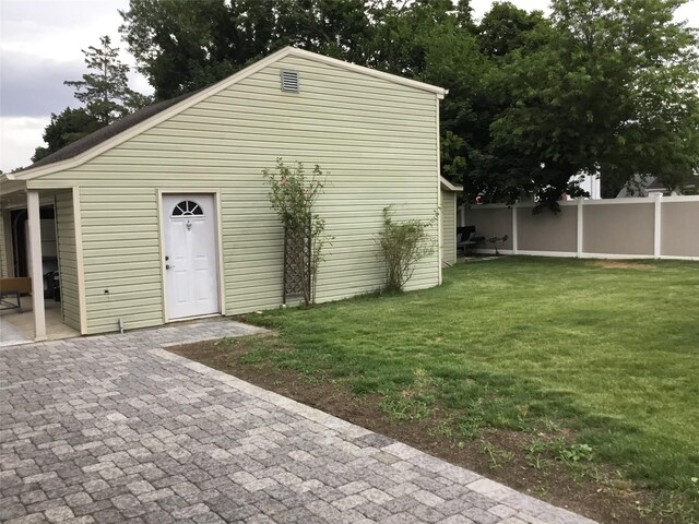 25 Herman Ave, North Babylon, NY 11703 - view of front facade with a patio