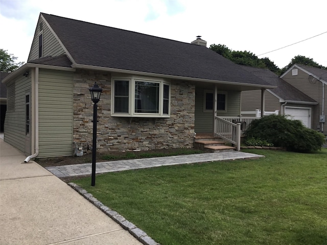 25 Herman Ave, North Babylon, NY 11703 - view of front of house featuring stone siding, roof with shingles, a front lawn, and a chimney