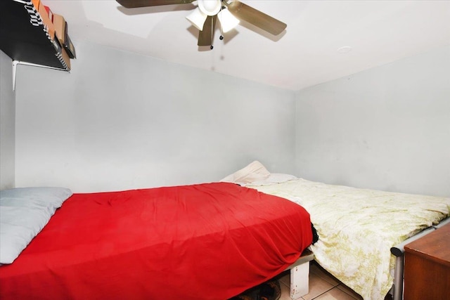 35-44 104th St, Corona, NY 11368 - tiled bedroom with a ceiling fan