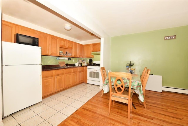 35-44 104th St, Corona, NY 11368 - kitchen with white appliances, dark countertops, light tile patterned floors, open shelves, and under cabinet range hood