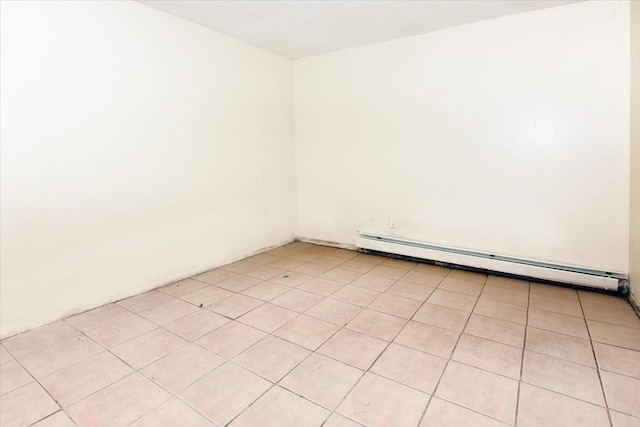 35-44 104th St, Corona, NY 11368 - unfurnished room featuring a baseboard heating unit and light tile patterned floors