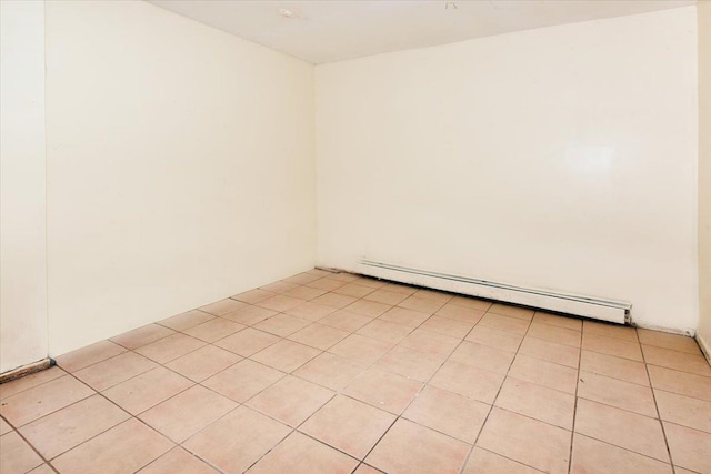 35-44 104th St, Corona, NY 11368 - spare room with a baseboard radiator and light tile patterned floors