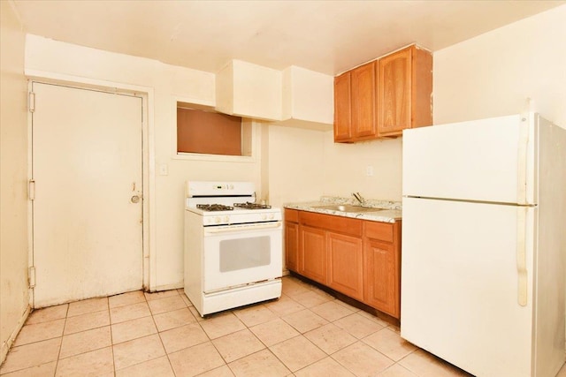 35-44 104th St, Corona, NY 11368 - kitchen featuring white appliances, light tile patterned floors, and light stone counters