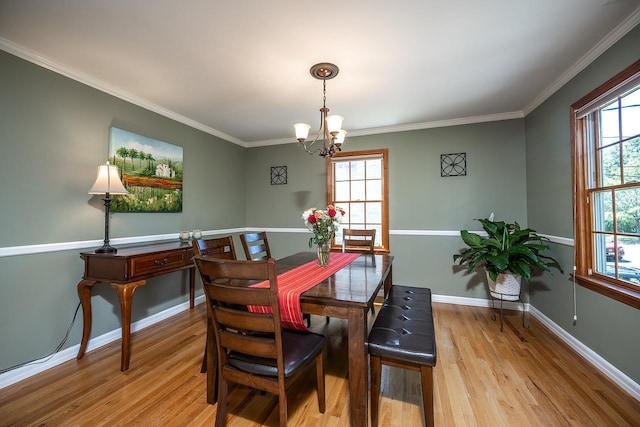 84 Macarthur Ln, Tarrytown, NY 10591 - dining room with a chandelier, wood finished floors, and ornamental molding