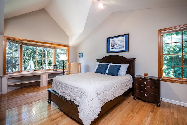 84 Macarthur Ln, Tarrytown, NY 10591 - bedroom featuring vaulted ceiling and light wood-style floors