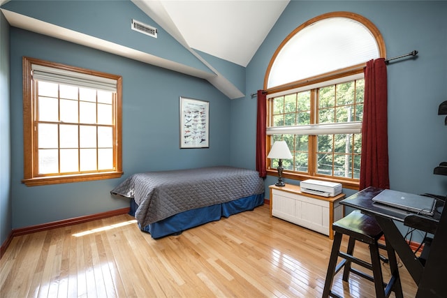 84 Macarthur Ln, Tarrytown, NY 10591 - bedroom with light wood-type flooring, lofted ceiling, and a desk