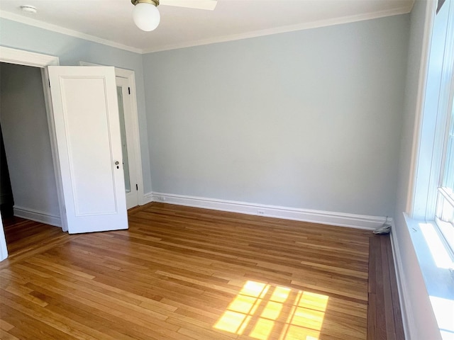 85 N Broadway Unit 2H, White Plains, NY 10603 - unfurnished bedroom with light wood-style flooring and ornamental molding
