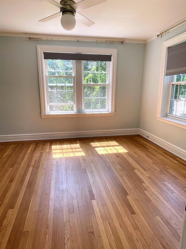 85 N Broadway Unit 2H, White Plains, NY 10603 - unfurnished room with hardwood / wood-style flooring, crown molding, and a ceiling fan