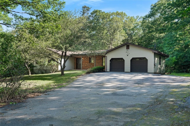 920 Mount Vernon Rd, Wurtsboro, NY 12790 - view of front of house featuring asphalt driveway and a garage