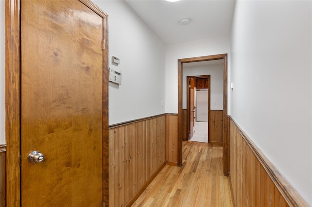 920 Mount Vernon Rd, Wurtsboro, NY 12790 - hallway with a wainscoted wall, light wood-type flooring, and wooden walls