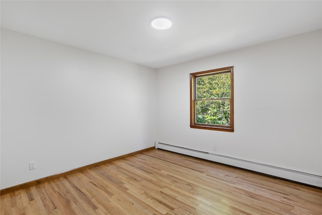 920 Mount Vernon Rd, Wurtsboro, NY 12790 - unfurnished room with baseboard heating and light wood-style flooring