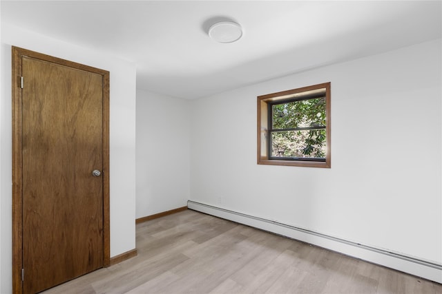 920 Mount Vernon Rd, Wurtsboro, NY 12790 - spare room featuring baseboard heating and light wood-style floors