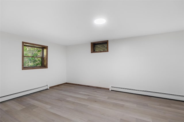 920 Mount Vernon Rd, Wurtsboro, NY 12790 - spare room featuring light wood-type flooring and a baseboard heating unit