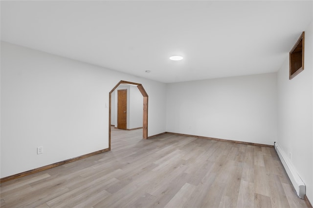920 Mount Vernon Rd, Wurtsboro, NY 12790 - unfurnished room with a baseboard heating unit and light wood-style floors