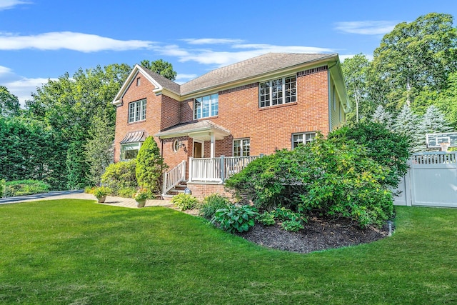 7 Hunter Ct, Dix Hills, NY 11746 - view of front of home with a front lawn and brick siding