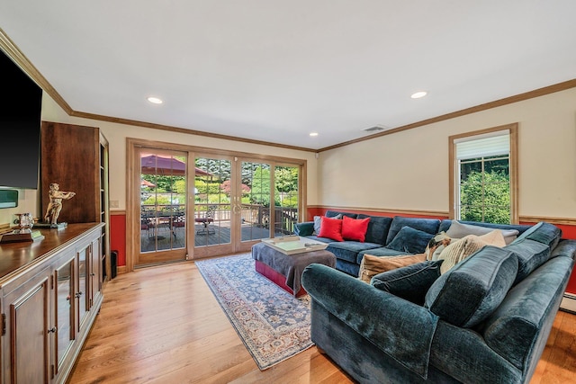 7 Hunter Ct, Dix Hills, NY 11746 - living area with wainscoting, french doors, light wood-style floors, plenty of natural light, and ornamental molding