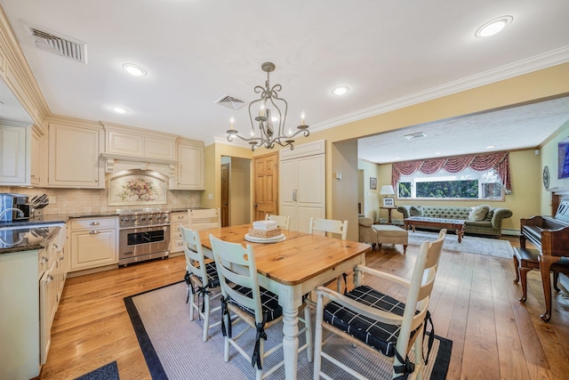 7 Hunter Ct, Dix Hills, NY 11746 - dining room with a chandelier, light wood finished floors, crown molding, and recessed lighting