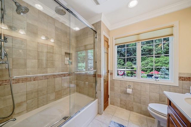 7 Hunter Ct, Dix Hills, NY 11746 - full bathroom featuring ornamental molding, tile walls, vanity, tile patterned floors, and bath / shower combo with glass door