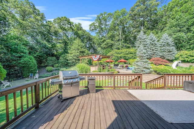 7 Hunter Ct, Dix Hills, NY 11746 - wooden terrace with a grill and view of scattered trees