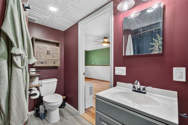 54 Graby Rd, Callicoon, NY 12723 - bathroom featuring wood finished floors, vanity, a wainscoted wall, and ceiling fan
