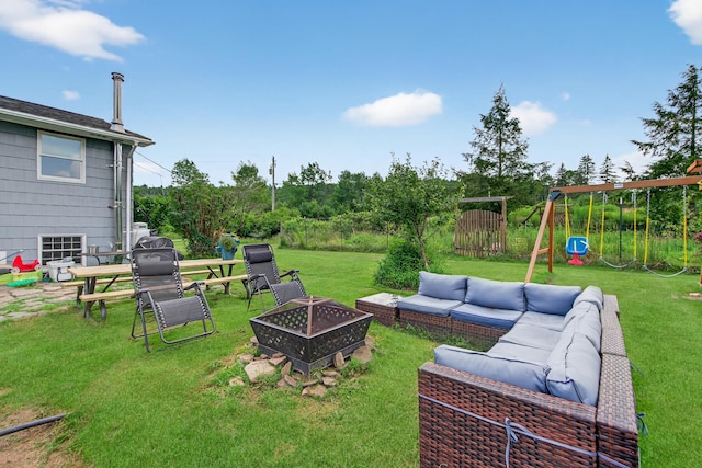 54 Graby Rd, Callicoon, NY 12723 - view of green lawn with a playground and an outdoor living space with a fire pit
