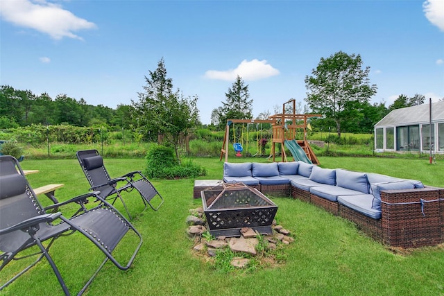 54 Graby Rd, Callicoon, NY 12723 - view of grassy yard featuring an outdoor living space with a fire pit and a playground