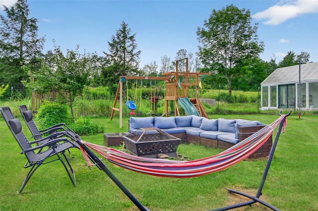 54 Graby Rd, Callicoon, NY 12723 - view of green lawn with a playground and an outdoor living space with a fire pit