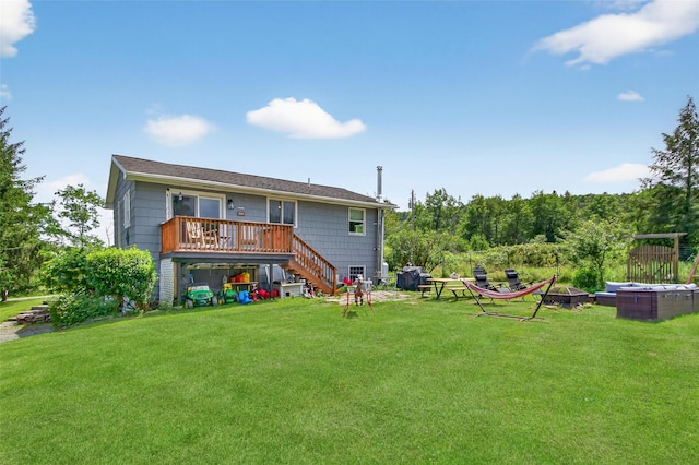 54 Graby Rd, Callicoon, NY 12723 - back of property with stairs, a yard, and a deck