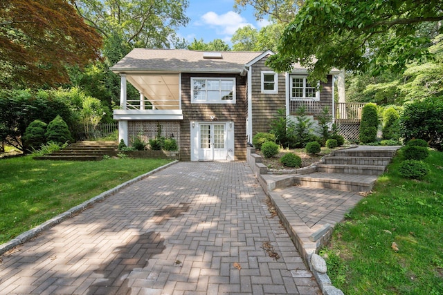 1459 N Country Rd, Wading River, NY 11792 - view of front of property featuring a front lawn and french doors