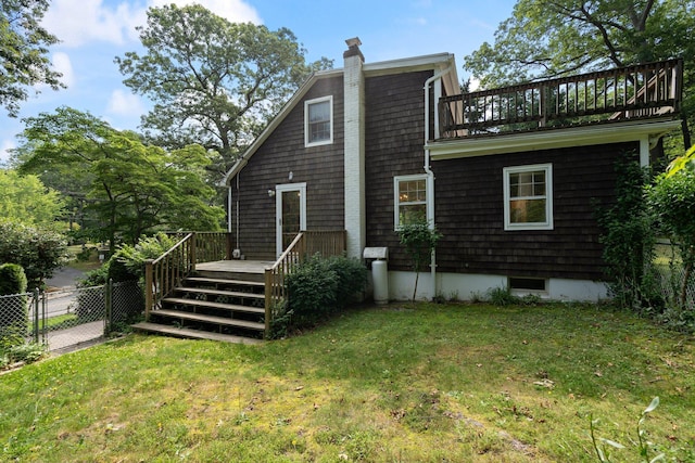 1459 N Country Rd, Wading River, NY 11792 - rear view of house with a chimney, a wooden deck, and a balcony