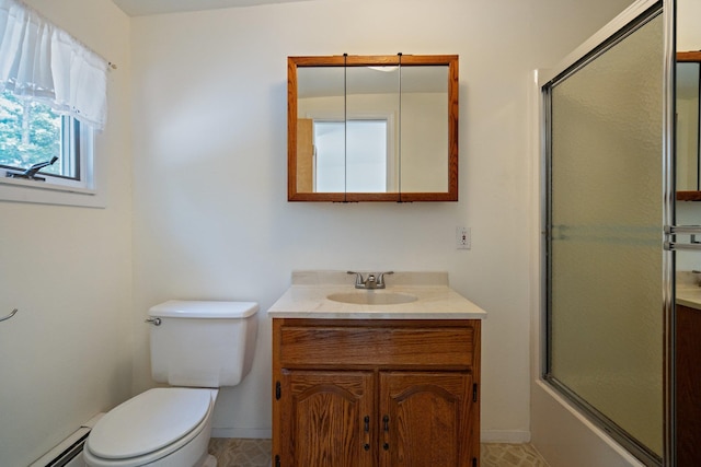 1459 N Country Rd, Wading River, NY 11792 - bathroom featuring vanity, a baseboard heating unit, and shower / bath combination with glass door
