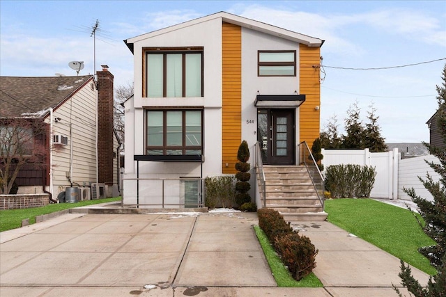 544 Oxford Rd, Cedarhurst, NY 11516 - contemporary home with stucco siding