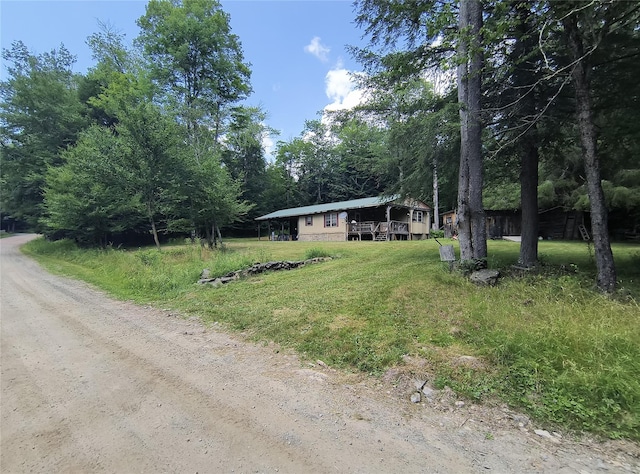 113 Lake Muskoday Rd, Roscoe, NY 12776 - manufactured / mobile home with a front yard