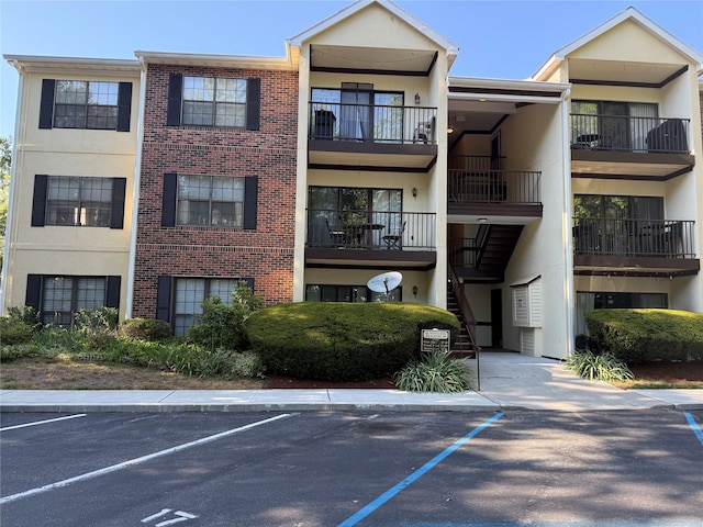 36 Huntington Cir, Peekskill, NY 10566 - view of apartment building / complex featuring uncovered parking