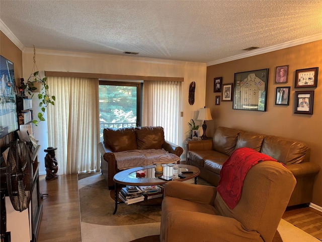 36 Huntington Cir, Peekskill, NY 10566 - living room featuring wood finished floors, a textured ceiling, and crown molding