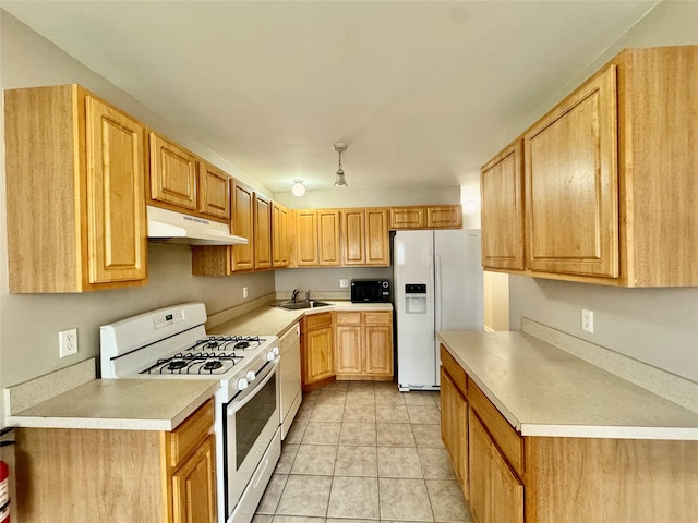 71 Jordan Ln, Middletown, NY 10940 - kitchen featuring white appliances, under cabinet range hood, light countertops, and light tile patterned floors