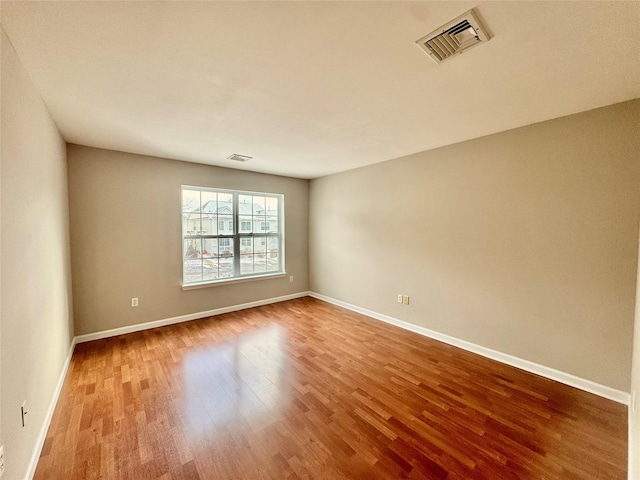 71 Jordan Ln, Middletown, NY 10940 - empty room featuring wood finished floors and baseboards