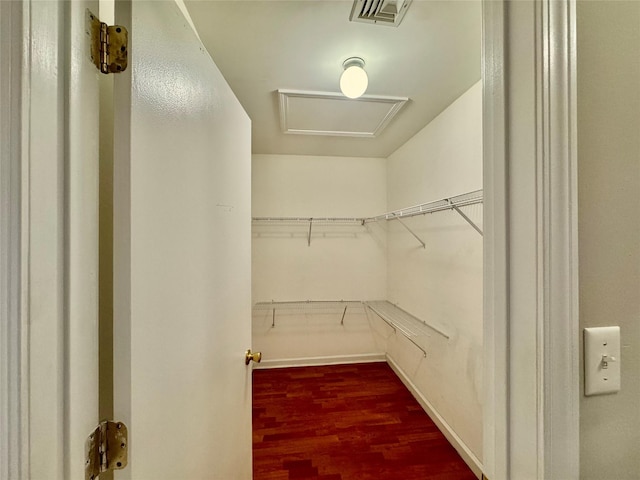 71 Jordan Ln, Middletown, NY 10940 - spacious closet featuring dark wood-style flooring and attic access