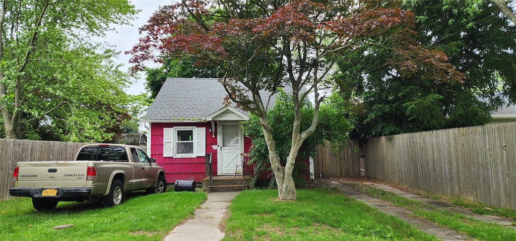 202 Forest Rd W, Mastic Beach, NY 11951 - view of front of house with a shingled roof and entry steps
