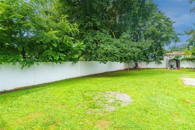 31 Peter Cooper Dr, Hyde Park, NY 12601 - fenced backyard featuring a playground