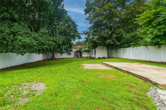 31 Peter Cooper Dr, Hyde Park, NY 12601 - fenced backyard with a shed and a patio