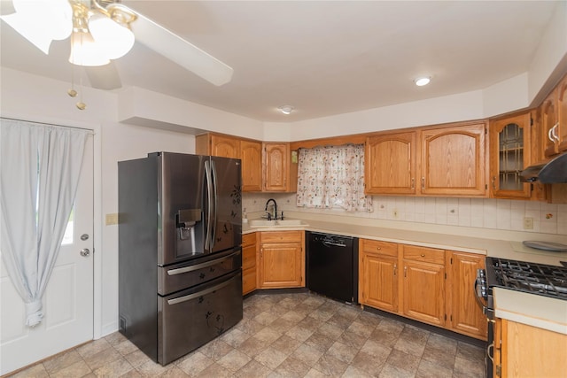 31 Peter Cooper Dr, Hyde Park, NY 12601 - kitchen with dishwasher, stainless steel fridge, gas stove, light countertops, and glass insert cabinets
