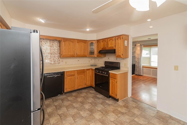 31 Peter Cooper Dr, Hyde Park, NY 12601 - kitchen featuring black appliances, under cabinet range hood, light countertops, backsplash, and ceiling fan