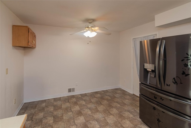 31 Peter Cooper Dr, Hyde Park, NY 12601 - unfurnished dining area with a ceiling fan and stone finish flooring