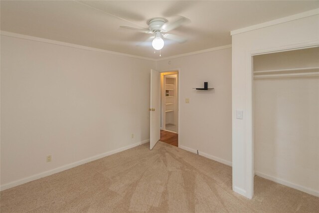 31 Peter Cooper Dr, Hyde Park, NY 12601 - unfurnished bedroom featuring light carpet, a closet, ornamental molding, and ceiling fan