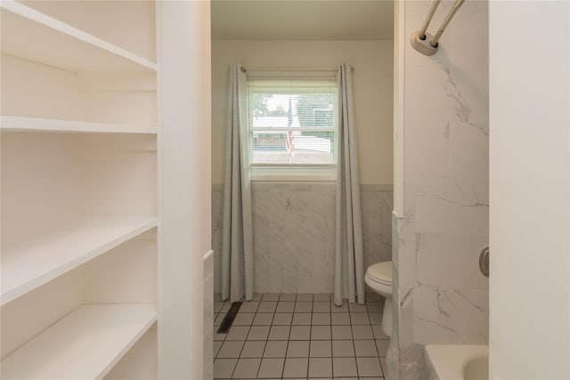 31 Peter Cooper Dr, Hyde Park, NY 12601 - full bathroom with tile walls, tile patterned flooring, a bathtub, and a shower