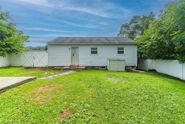 31 Peter Cooper Dr, Hyde Park, NY 12601 - back of property featuring entry steps, a fenced backyard, and a gate