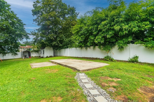 31 Peter Cooper Dr, Hyde Park, NY 12601 - fenced backyard with a patio area and a storage shed