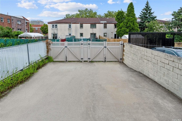 110-17 64th Ave, Forest Hills, NY 11375 - view of patio / terrace with a gate and a residential view