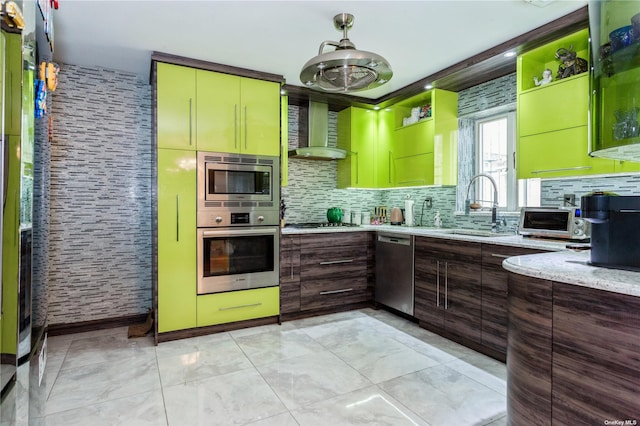 110-17 64th Ave, Forest Hills, NY 11375 - kitchen featuring stainless steel appliances, wall chimney exhaust hood, backsplash, and light stone countertops